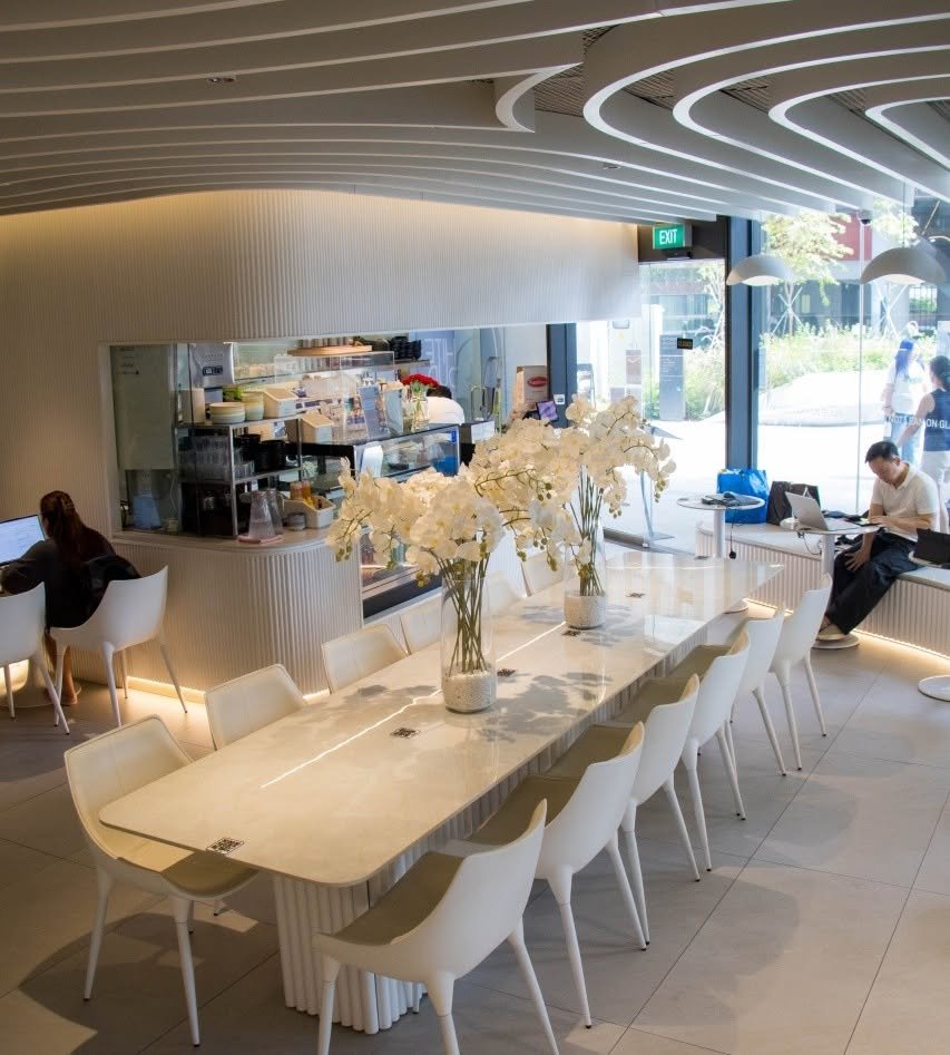 Bright white interior of White Cloud Cafe at Punggol Coast Mall